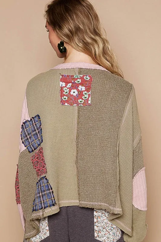 Sewn patch oversized knit top